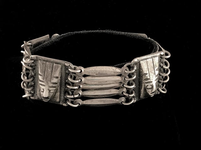 Taxco silver linked bracelet with faces